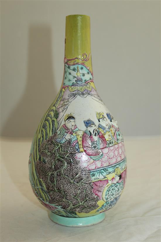 A Chinese moulded and enamelled biscuit porcelain bottle vase, Qianlong seal mark, 19th century, 22.5cm, neck restored
